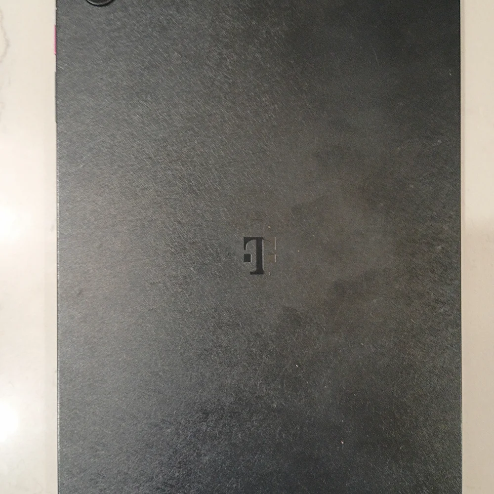 Sleek Black Tablet with Vibrant Pink Display